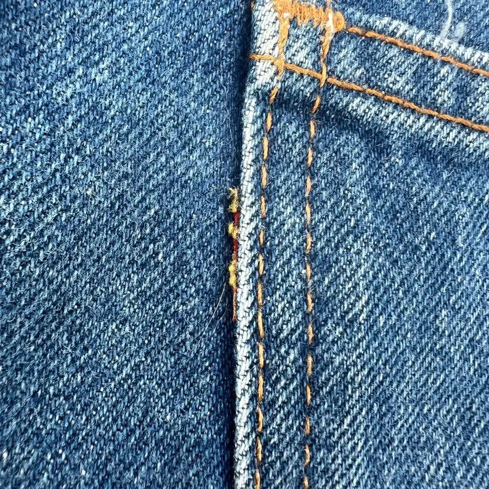 Vintage 80s Levi’s orange tab 517 boot cut blue denim jeans 36x36